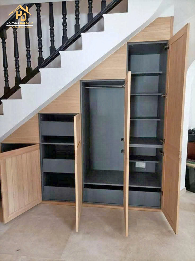 dong-gam-tu-cau-thang-4 Báo Giá Thi Công Nội Thất Phòng Khách Đẹp Tại TPHCM