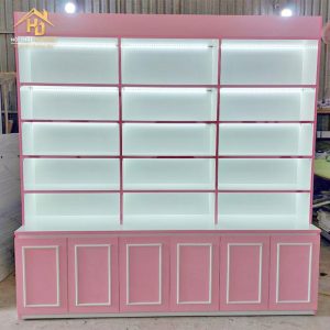 kệ trưng bày mỹ phẩm màu hồng có led