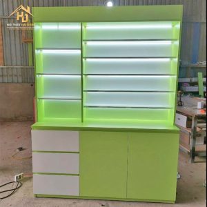 tu trung bay mau xanh la 1