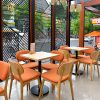 Bàn ghế cafe chân gỗ đệm cam